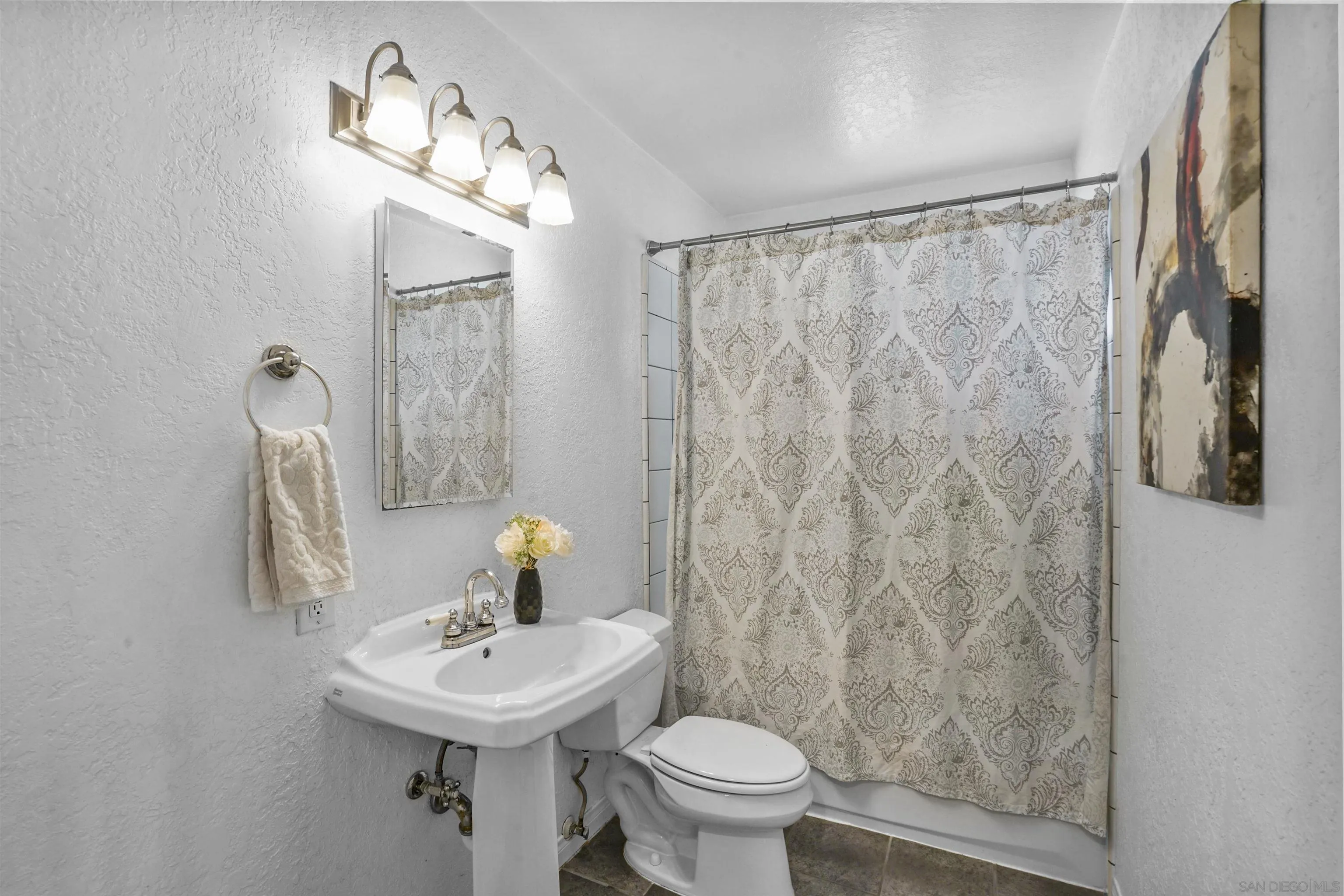 10111 White Pine Lane Santee, CA 92071 - Photo 24 of 35 a bathroom with a sink toilet and a mirror