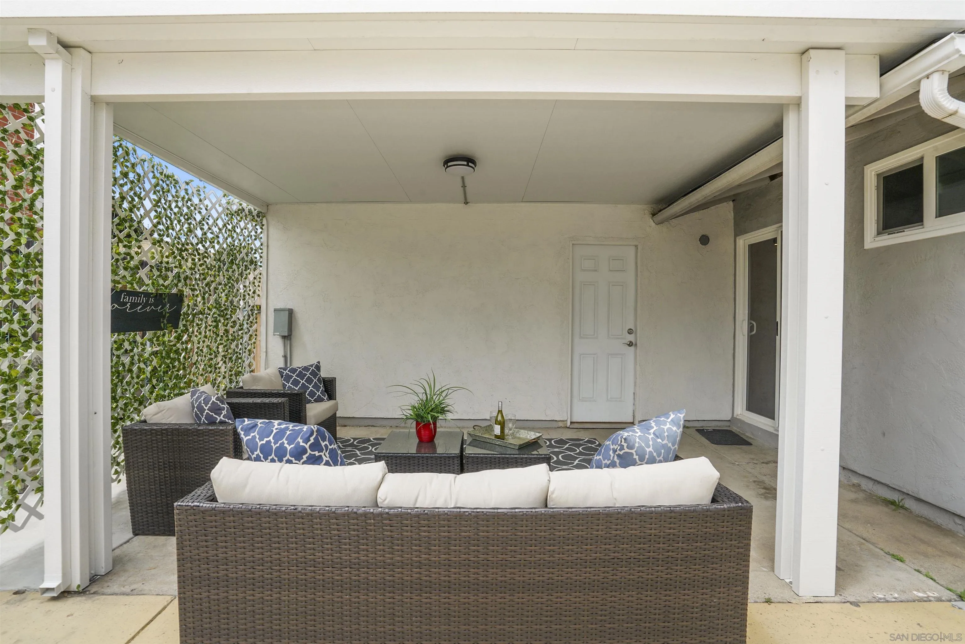 10111 White Pine Lane Santee, CA 92071 - Photo 33 of 35 a living room with furniture and a potted plant