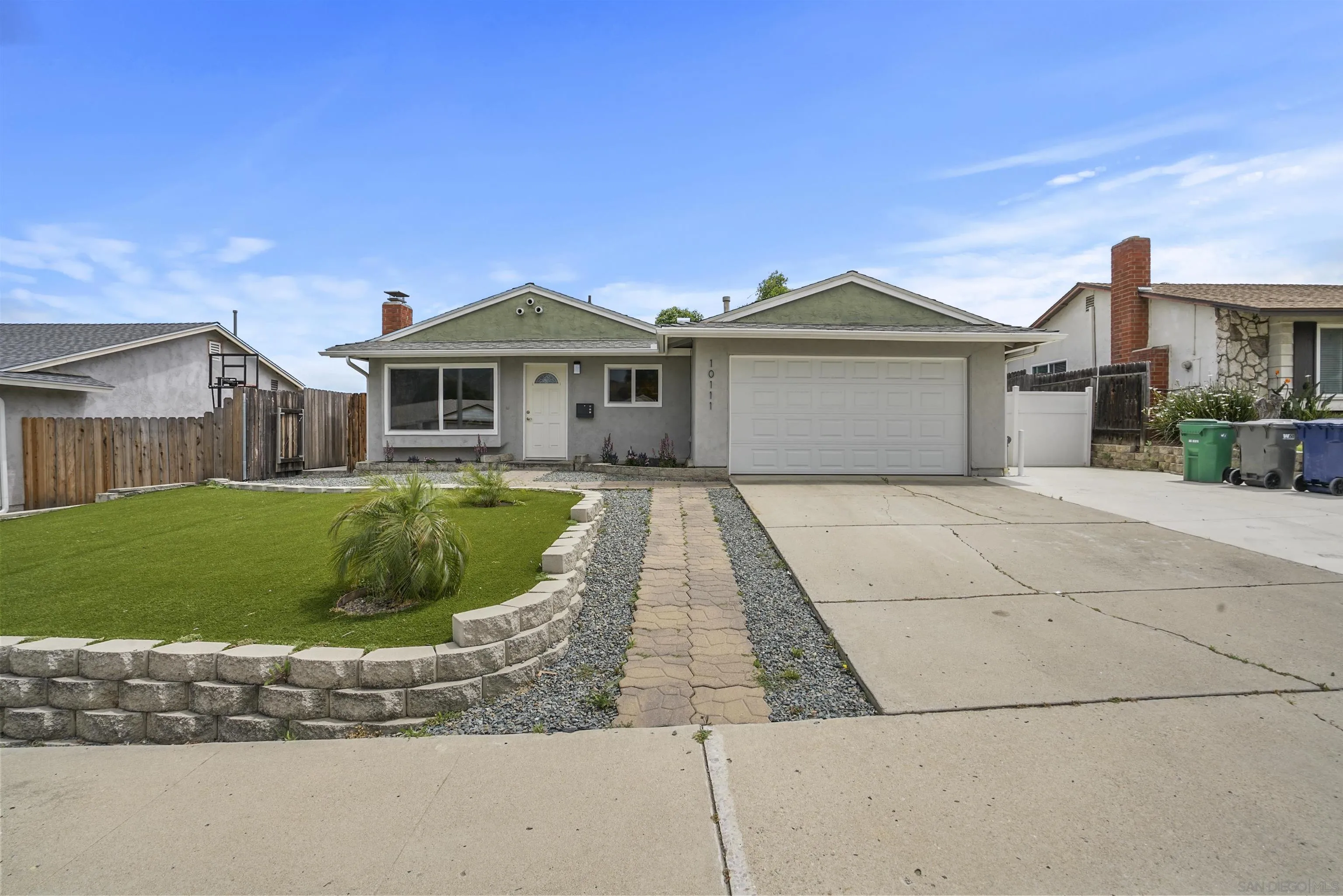 10111 White Pine Lane Santee, CA 92071 - Photo 35 of 35 a front view of a house with a yard