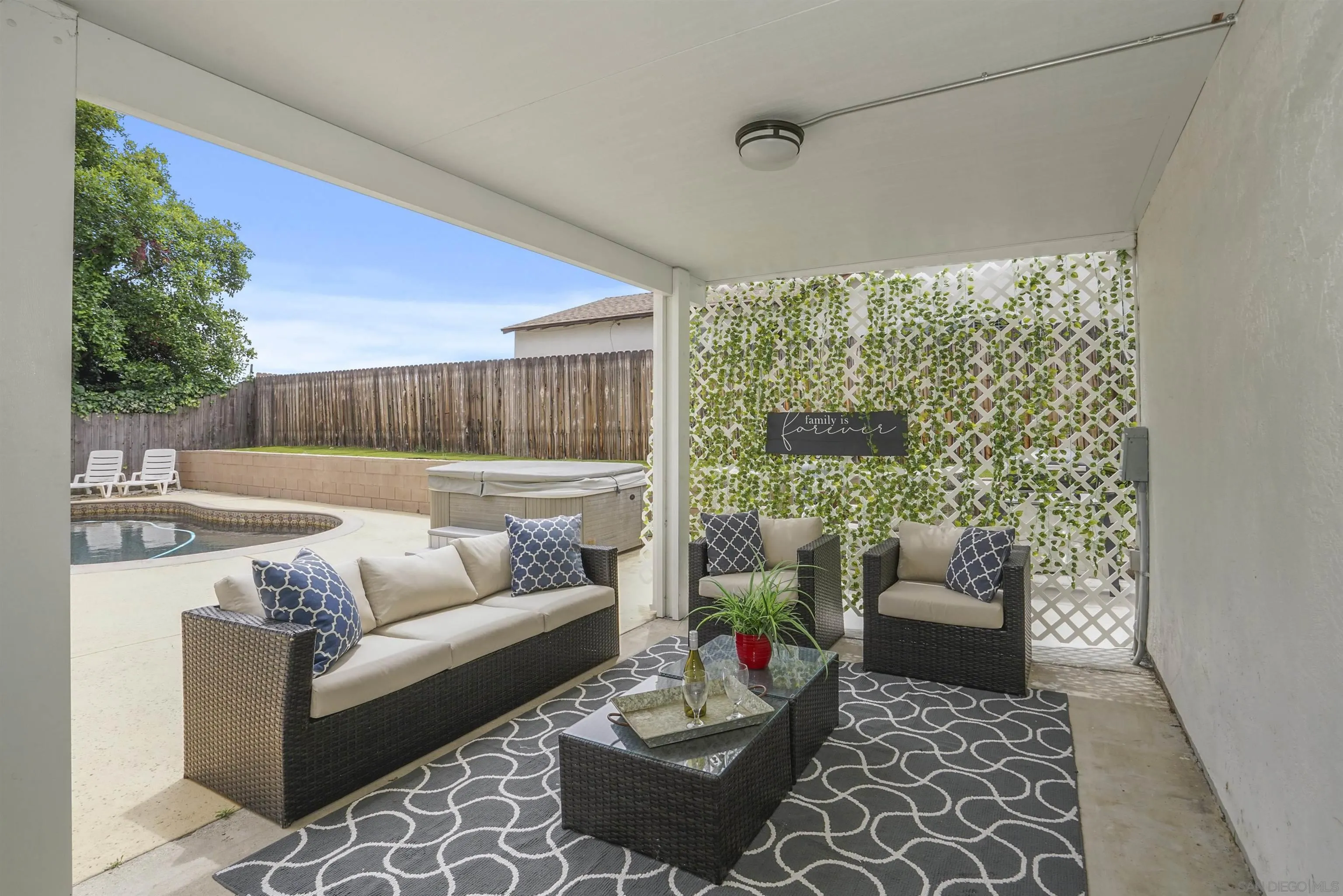 10111 White Pine Lane Santee, CA 92071 - Photo 4 of 35 a living room with furniture and a large window