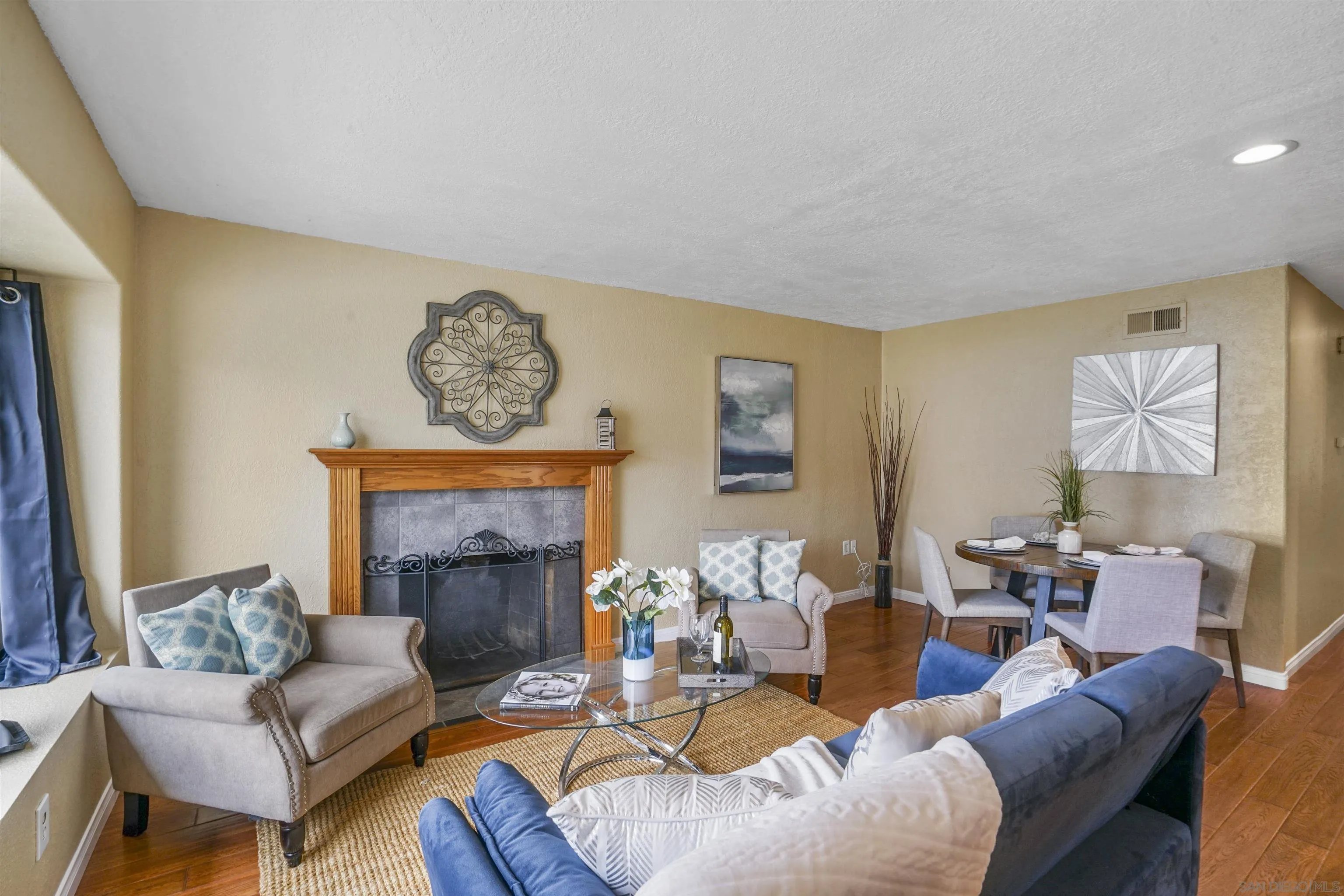 10111 White Pine Lane Santee, CA 92071 - Photo 5 of 35 a living room with furniture and a fireplace