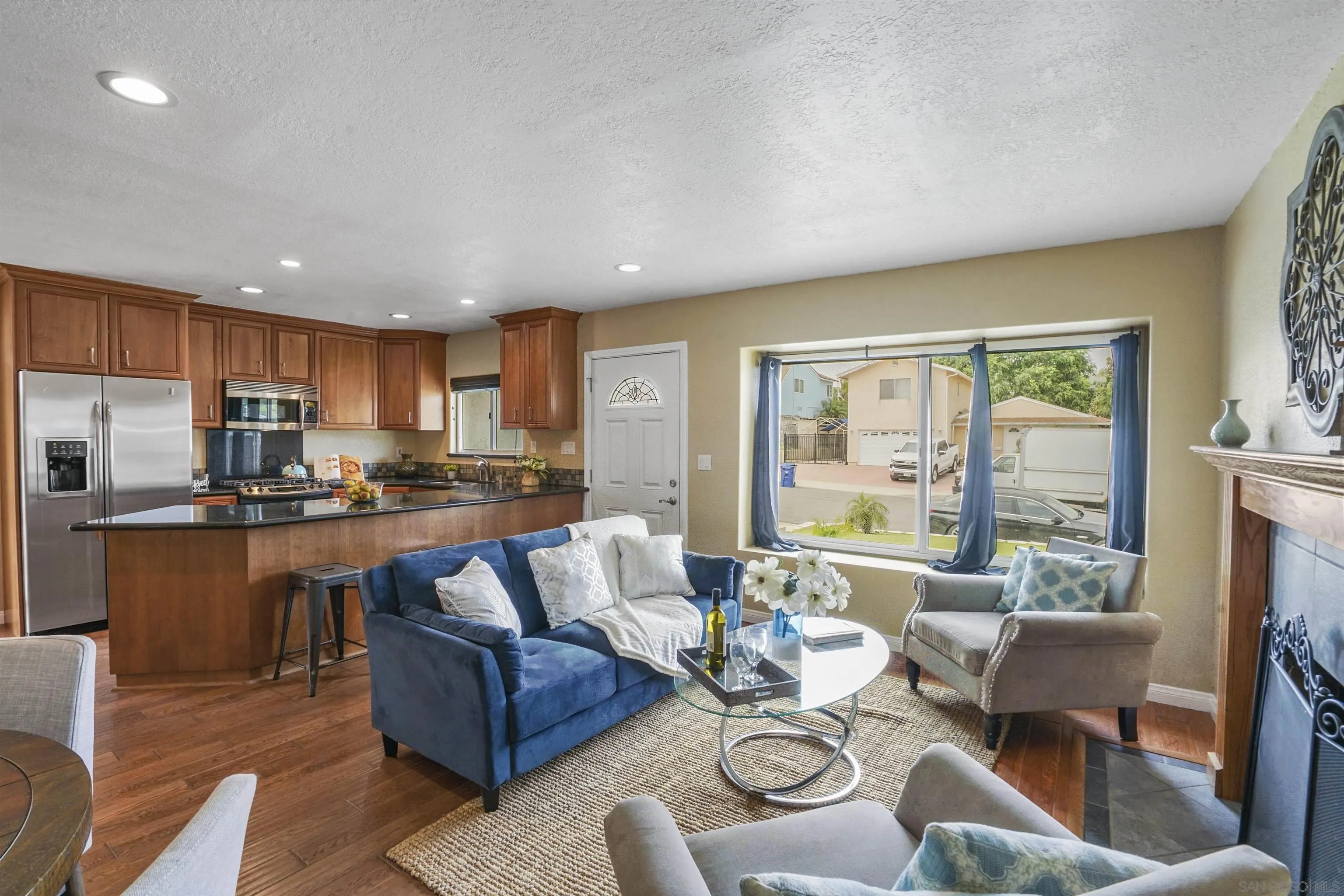 10111 White Pine Lane Santee, CA 92071 - Photo 7 of 35 a living room with furniture kitchen and a large window