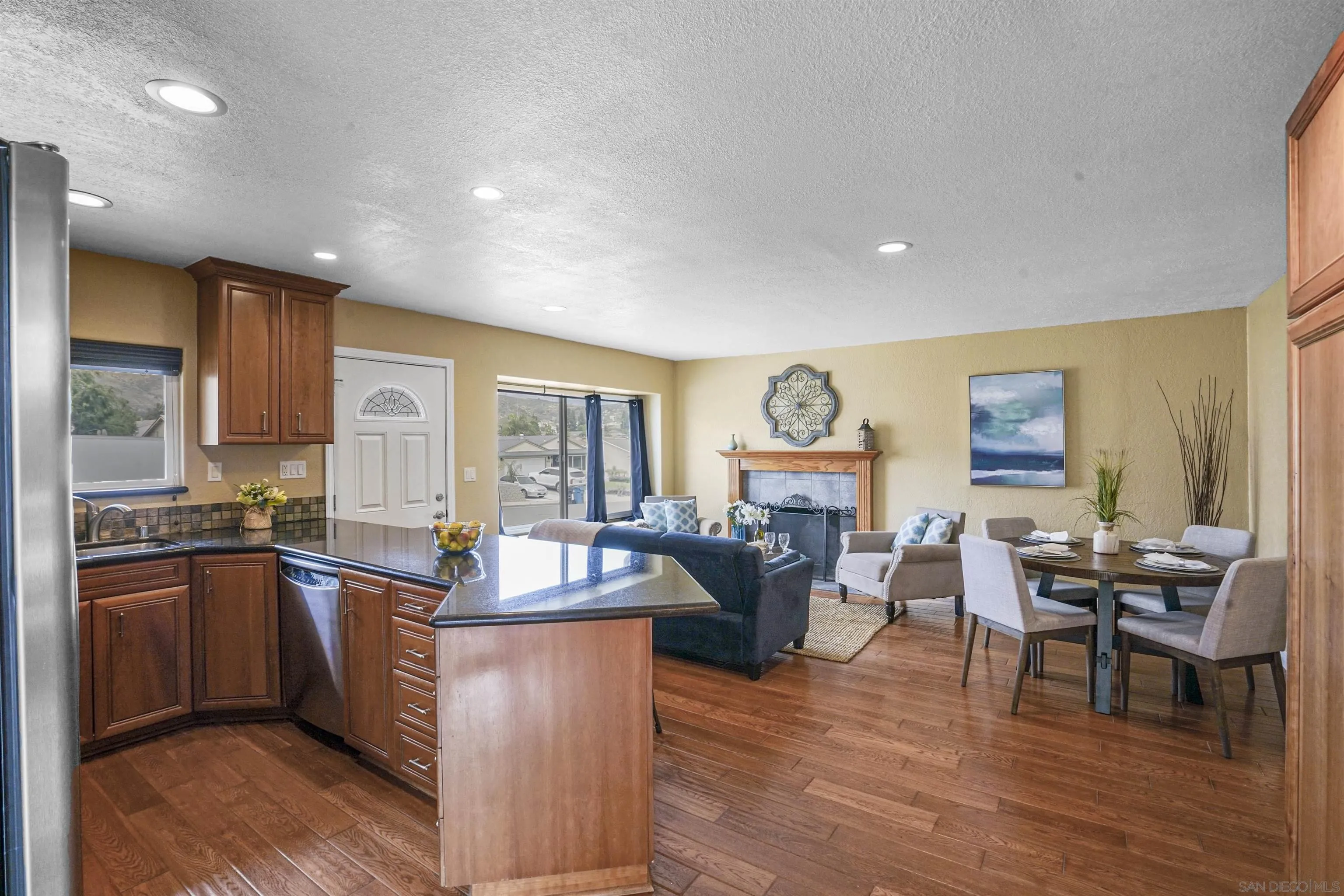 10111 White Pine Lane Santee, CA 92071 - Photo 10 of 35 a kitchen with sink stove and cabinets