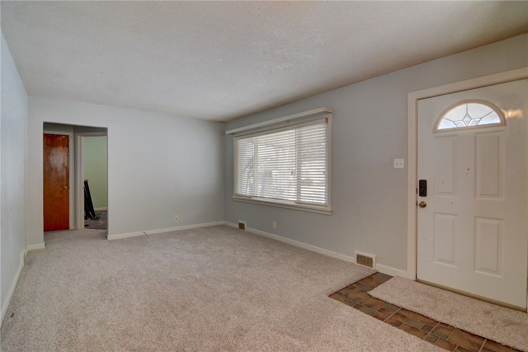 47 1st South Shores Avenue Decatur, IL 62521 - Photo 12 of 24 a view of an empty room with a window