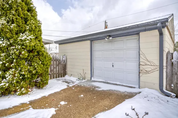 a view of a house with a small yard