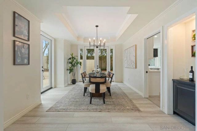 a view of a dining room with furniture window and outside view