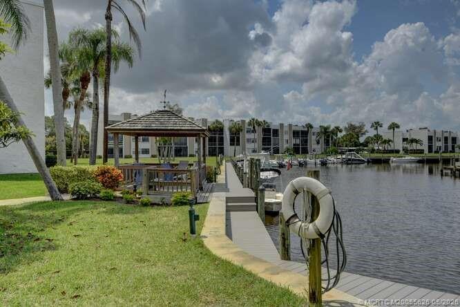 1950 Southwest Palm City Road, Unit 3209 Stuart, FL 34994 - Photo 35 of 64 Newly renovated seawall.