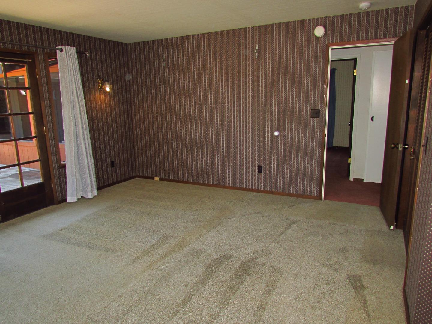 3355 Conant Lane Watsonville, CA 95076 - Photo 23 of 52 a view of an empty room with entrance and door