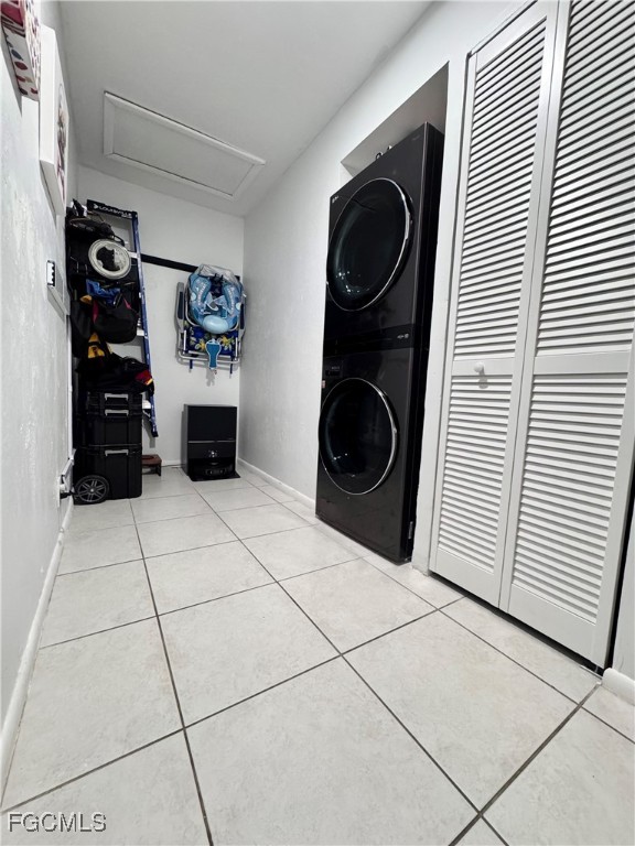 4079 Northlight Drive, Unit 1802 Naples, FL 34112 - Photo 29 of 29 a utility room with dryer and washer