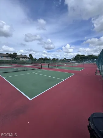 a view of a golf course with a lake