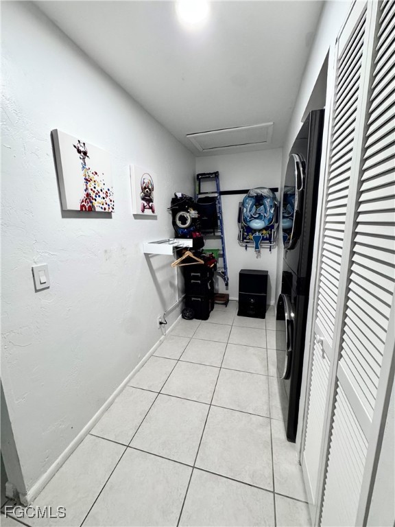 4079 Northlight Drive, Unit 1802 Naples, FL 34112 - Photo 6 of 29 a view of kitchen with a refrigerator