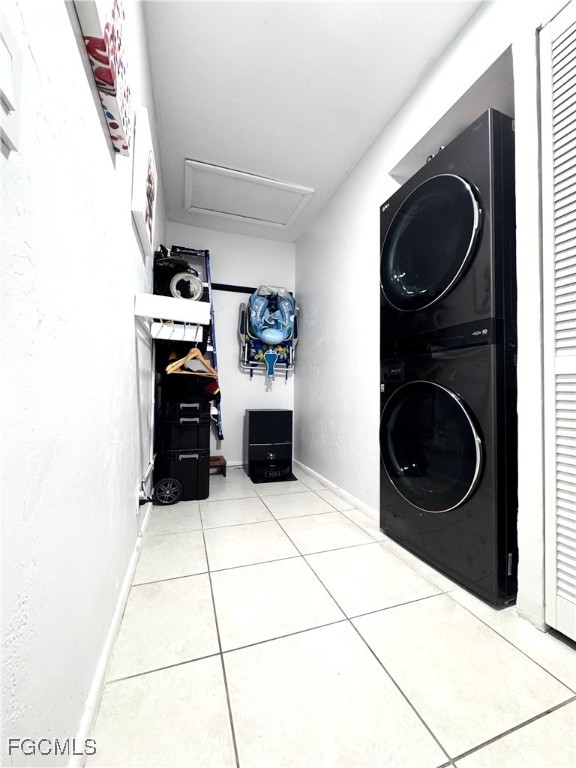 4079 Northlight Drive, Unit 1802 Naples, FL 34112 - Photo 7 of 29 a view of a storage & utility room with washer and dryer