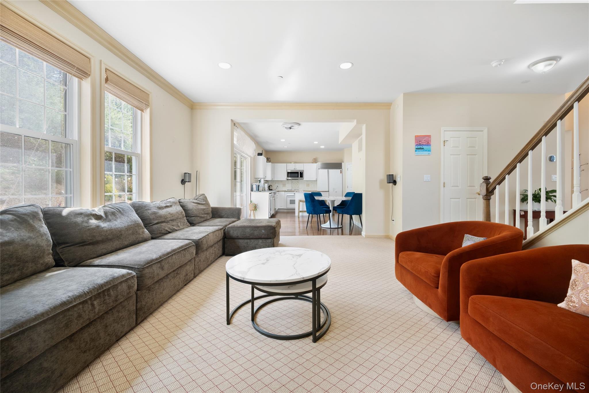 26 Bellefair Road Rye Brook, NY 10573 - Photo 5 of 25 a living room with furniture a rug and a large window