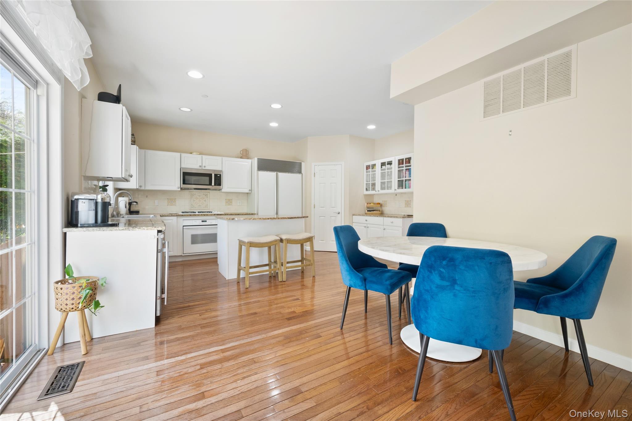 26 Bellefair Road Rye Brook, NY 10573 - Photo 8 of 25 a view of kitchen with cabinets and wooden floor