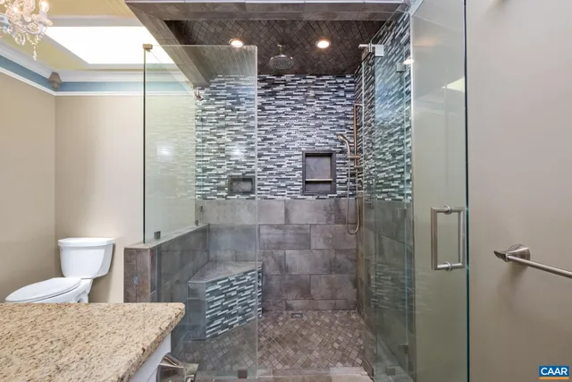 a view of an chairs and table in the yard