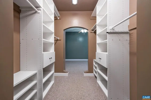 a front view of a house with a yard table and chairs