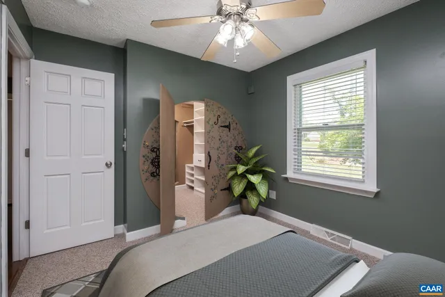 a view of a house with swimming pool and a yard