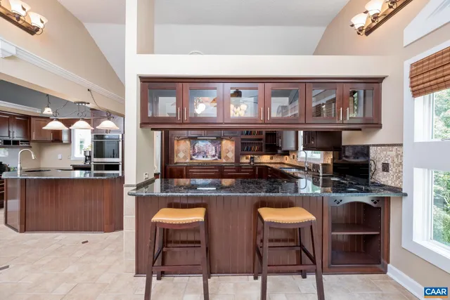 a living room with a couch and a large window