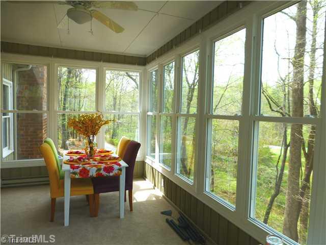 5008 Golden Acres Road Oak Ridge, NC 27310 - Photo 7 of 16 Sunroom.