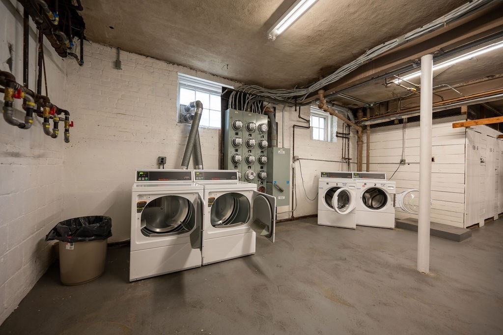 56 Elm Street, Unit 1 Worcester, MA 01609 - Photo 21 of 22 a utility room with dryer and washer