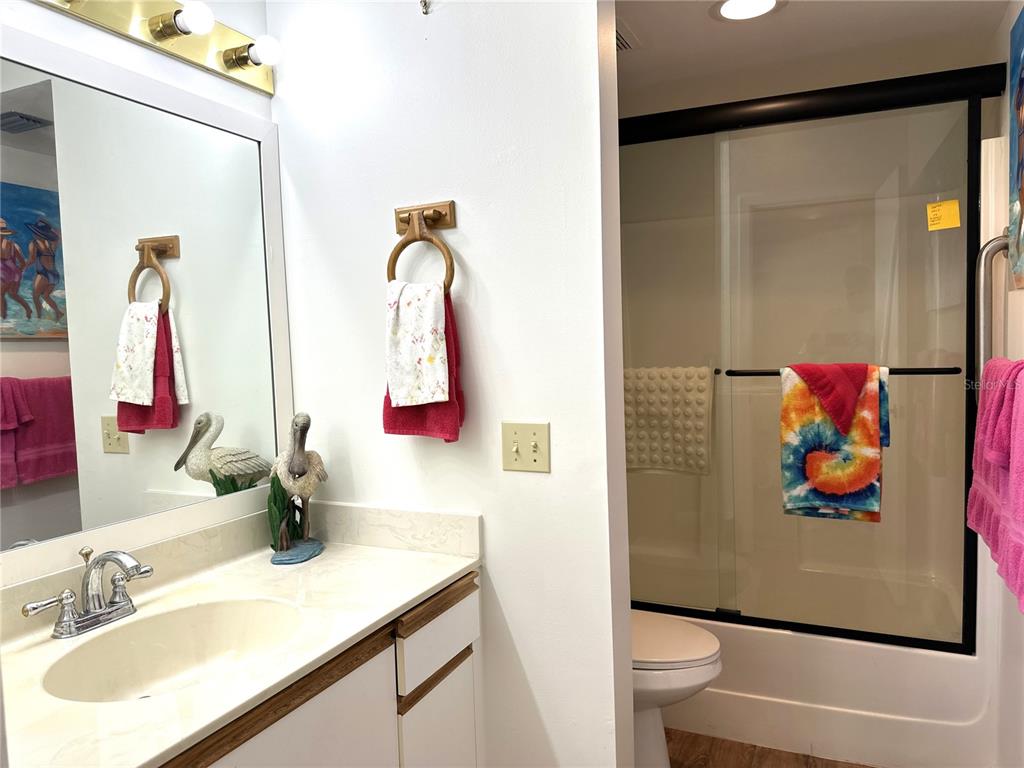 6800 Placida Road, Unit 163 Englewood, FL 34224 - Photo 18 of 24 a bathroom with a sink and a mirror