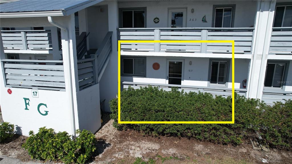6800 Placida Road, Unit 163 Englewood, FL 34224 - Photo 2 of 24 a view of a house with a swimming pool