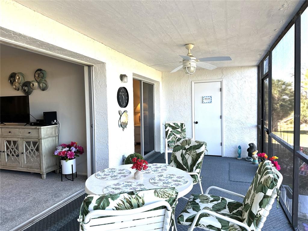 6800 Placida Road, Unit 163 Englewood, FL 34224 - Photo 23 of 24 a living room with furniture and wooden floor