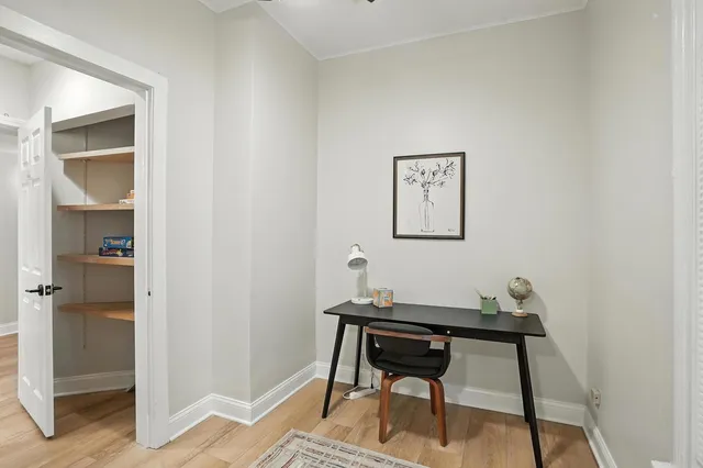 a bedroom with bed and a window