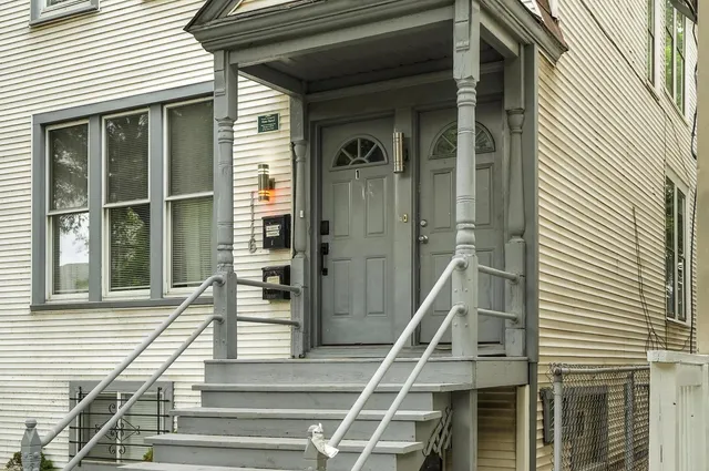 a front view of a house with a porch