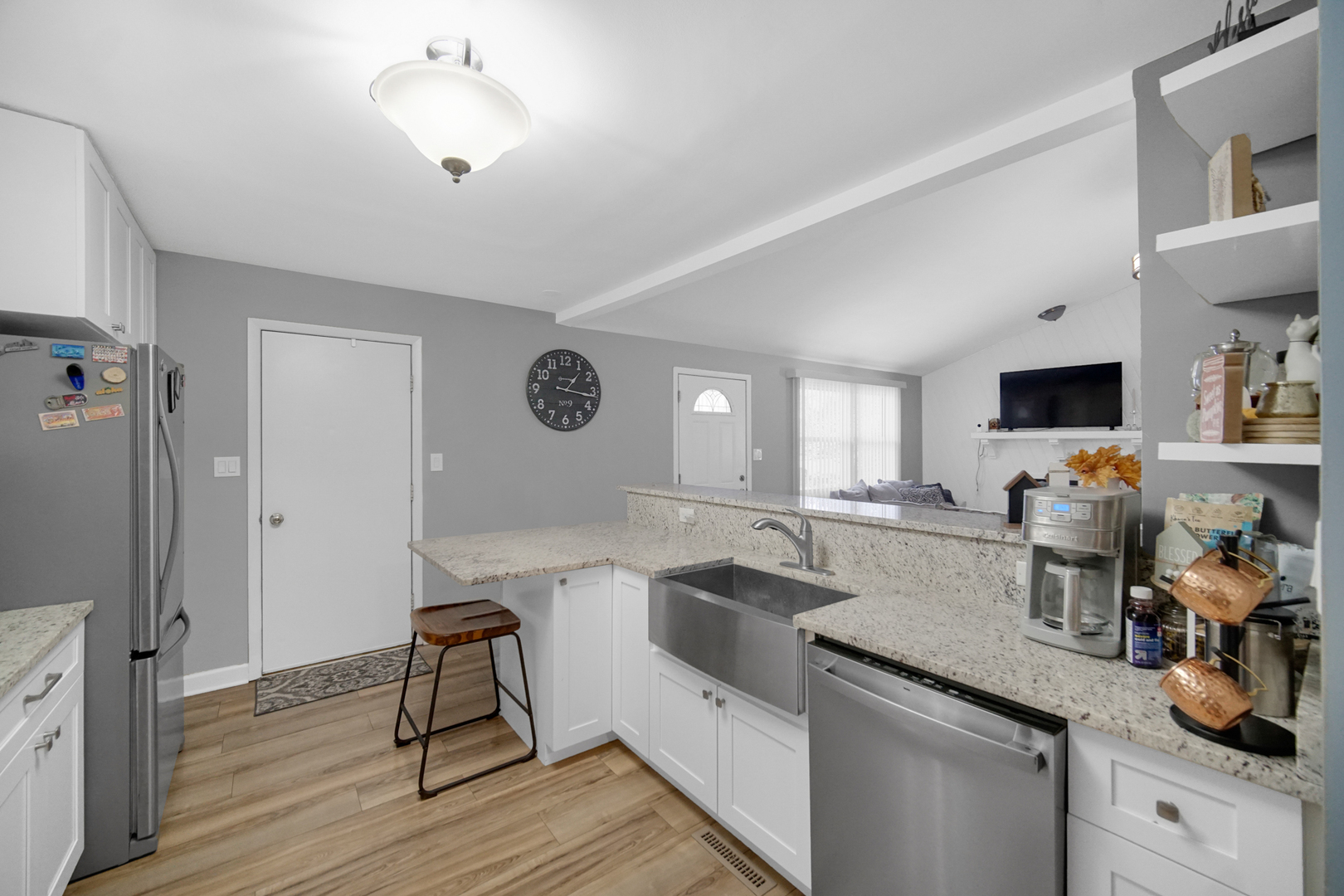 503 South Raven Road Shorewood, IL 60404 - Photo 9 of 21 a kitchen with a sink cabinets and wooden floor