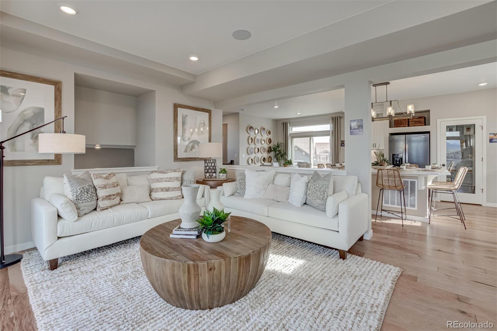 1188 Sugarloaf Road Boulder, CO 80302 - Photo 13 of 35 a living room with furniture and a wooden floor