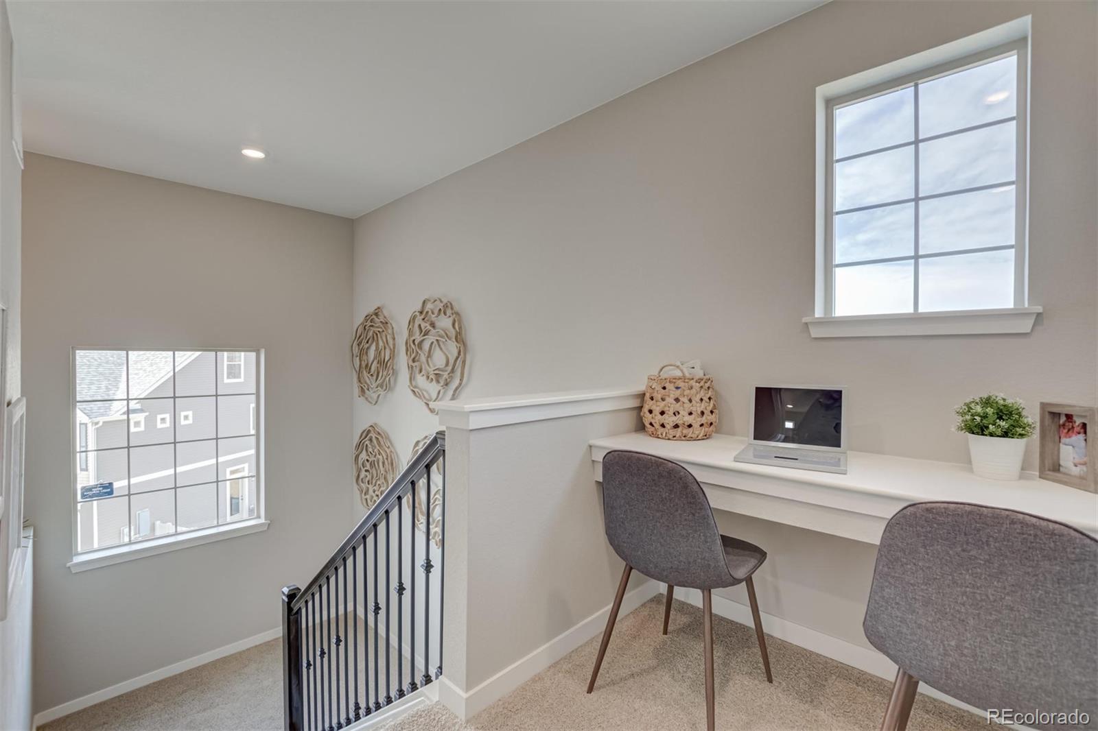 1188 Sugarloaf Road Boulder, CO 80302 - Photo 20 of 35 a view of a workspace with furniture and a window
