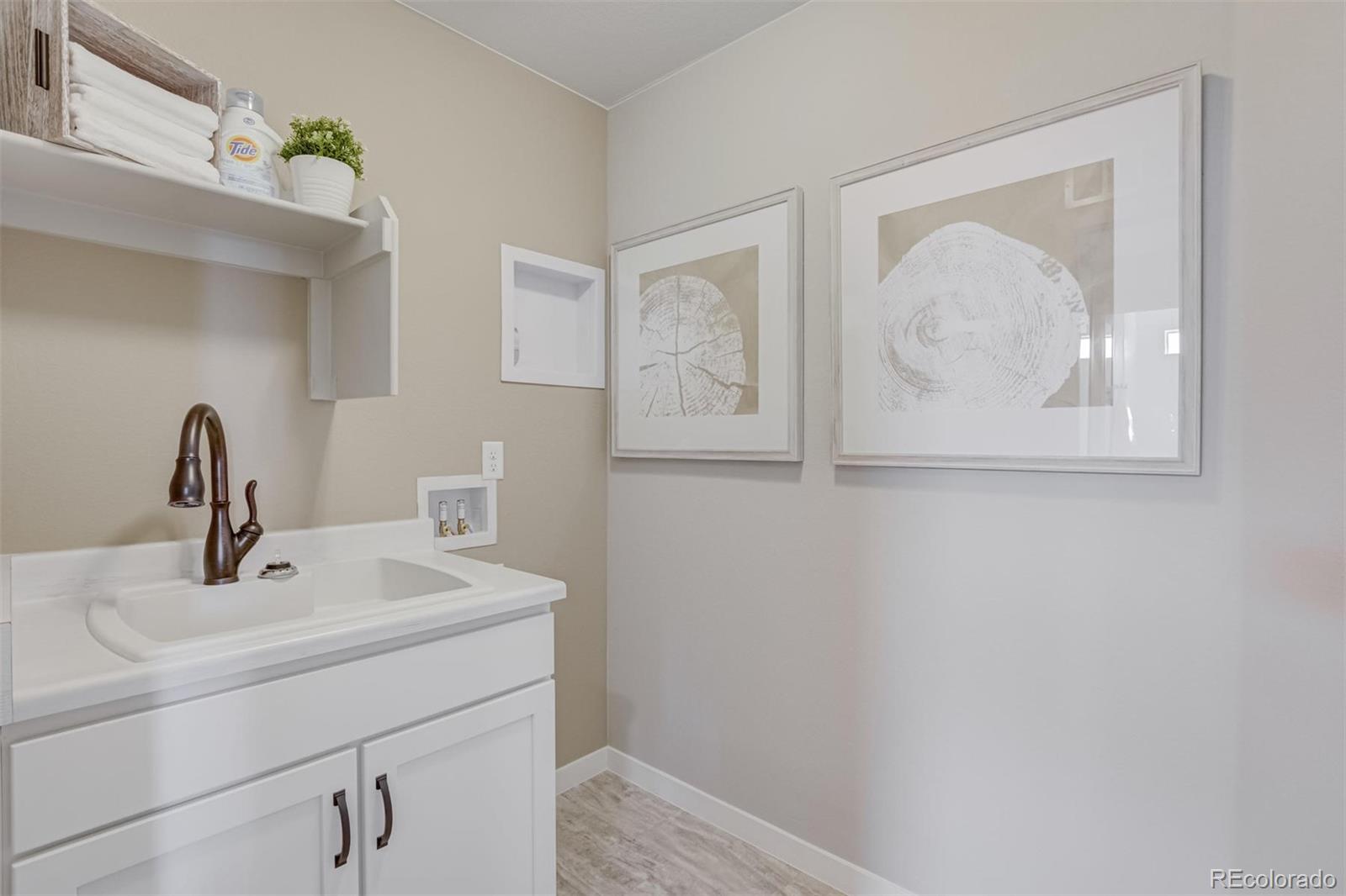 1188 Sugarloaf Road Boulder, CO 80302 - Photo 29 of 35 a bathroom with a sink and mirror