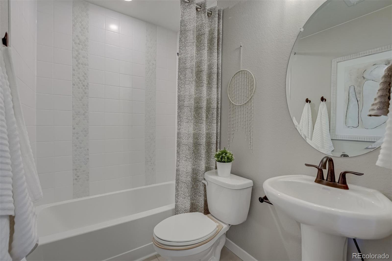 1188 Sugarloaf Road Boulder, CO 80302 - Photo 34 of 35 a bathroom with a sink toilet and shower