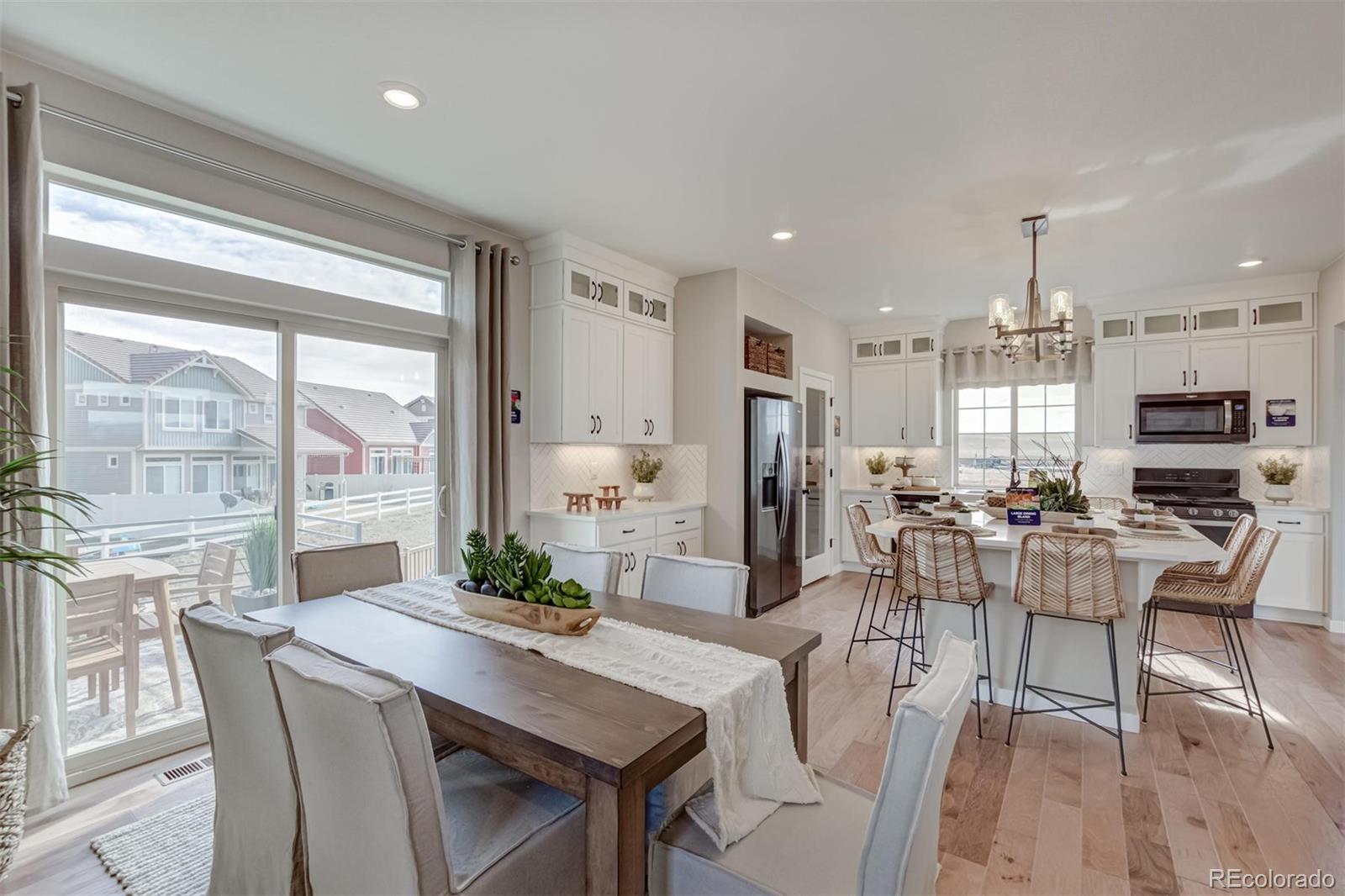 1188 Sugarloaf Road Boulder, CO 80302 - Photo 5 of 35 a view of a dining room with furniture window and outside view