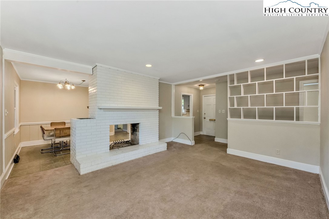 5524 Seacroft Road Charlotte, NC 28210 - Photo 14 of 36 a view of a livingroom with furniture and a fireplace