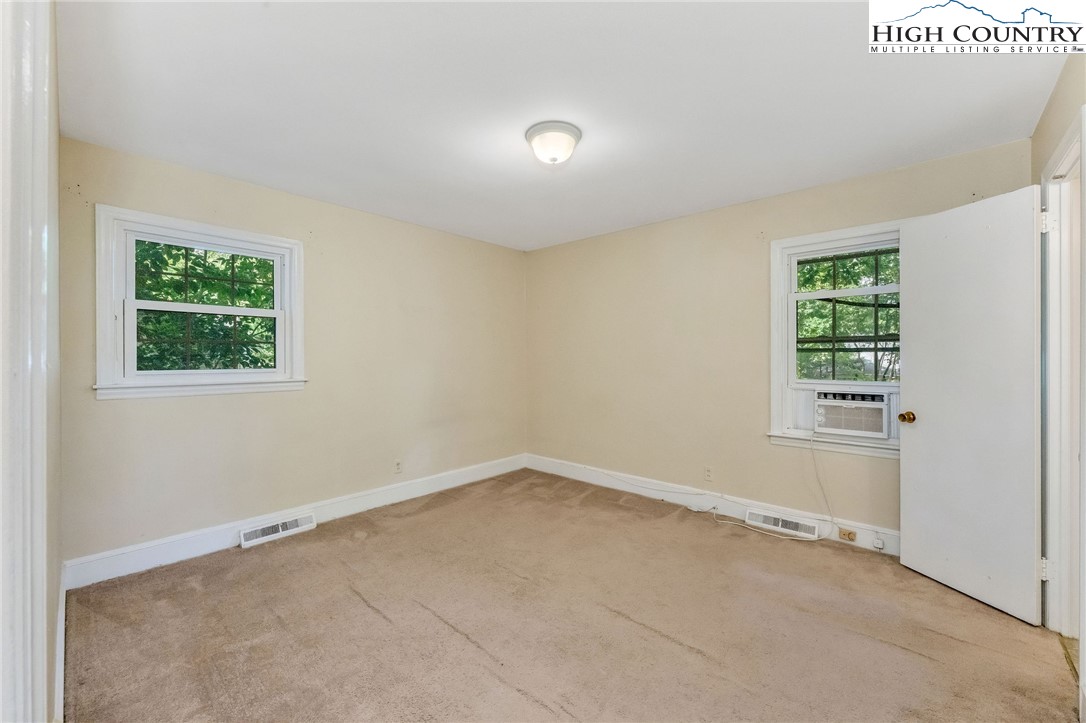 5524 Seacroft Road Charlotte, NC 28210 - Photo 26 of 36 an empty room with windows