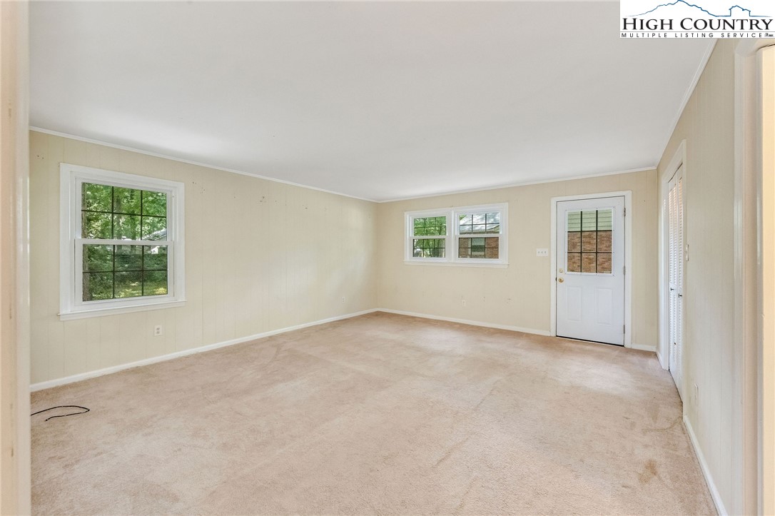 5524 Seacroft Road Charlotte, NC 28210 - Photo 29 of 36 an empty room with windows