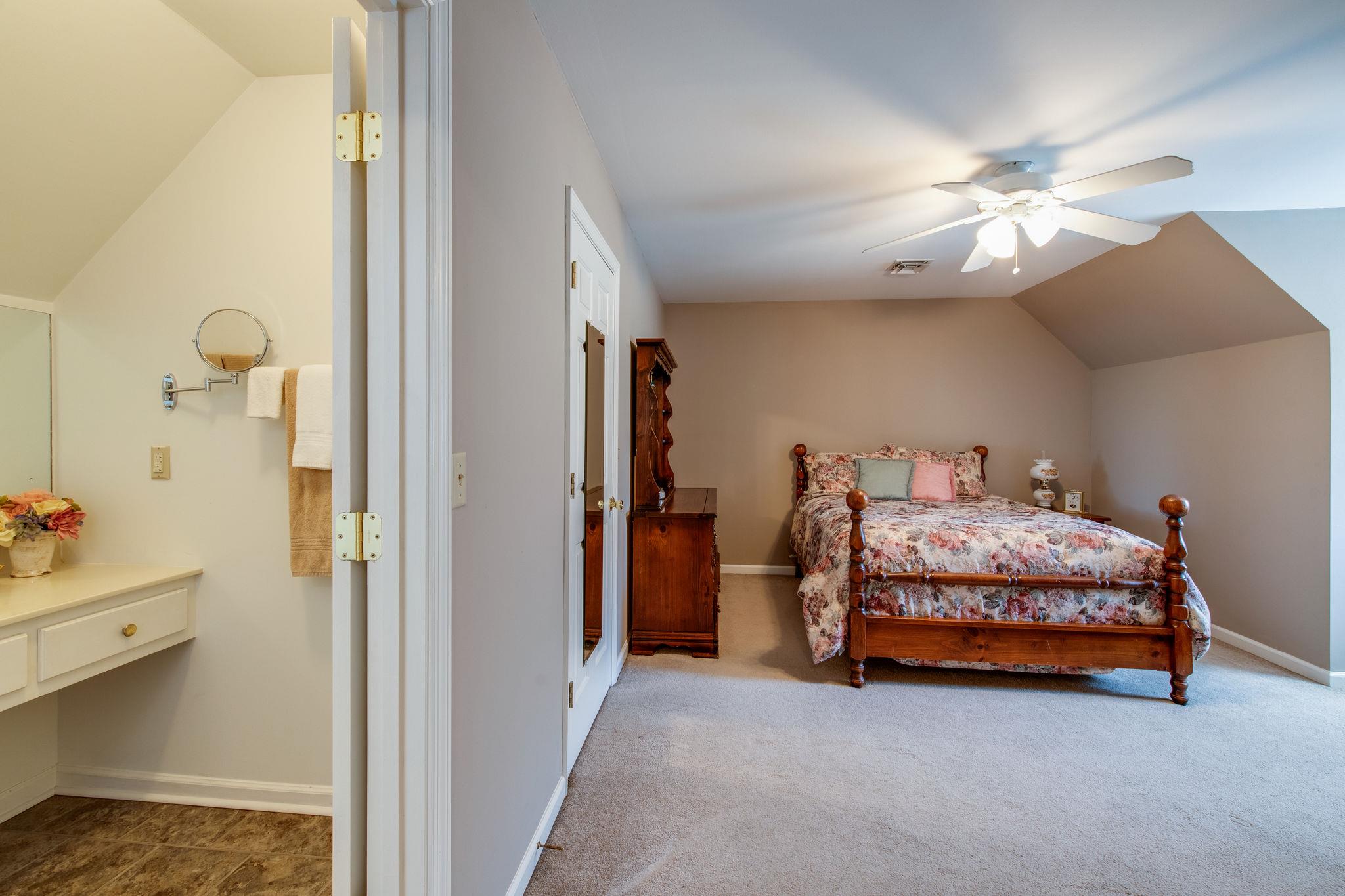 1918 Lake Road Greenbrier, TN 37073 - Photo 23 of 30 The 3rd full bath is a jack and jill shared by bedrooms 3 & 4.