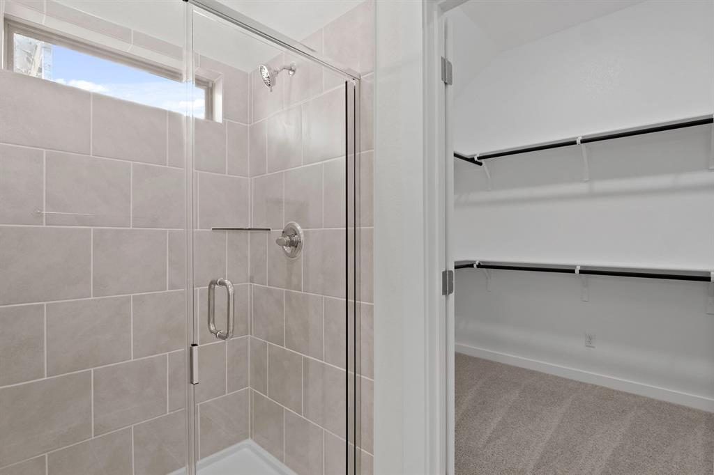 8336 Coastal Lane Pilot Point, TX 76258 - Photo 11 of 17 Primary Bathroom in the Pecan II home plan by Trophy Signature Homes – REPRESENTATIVE PHOTO