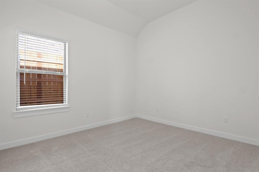 8336 Coastal Lane Pilot Point, TX 76258 - Photo 14 of 17 Bedroom in the Pecan II home plan by Trophy Signature Homes – REPRESENTATIVE PHOTO