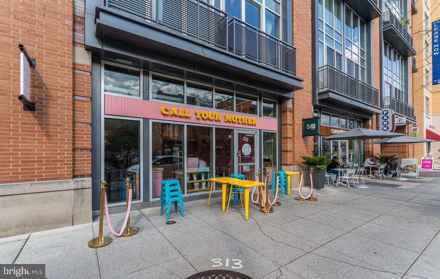 1615 Q Street Northwest, Unit 301/303 Washington, DC 20009 - Photo 26 of 53 a view of a building with sitting area