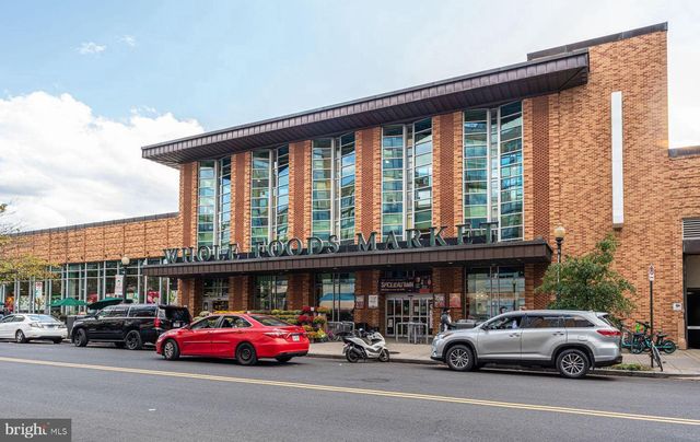 a view of street with sitting area
