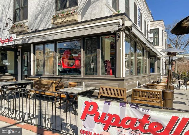 a view of a chair and table in the patio