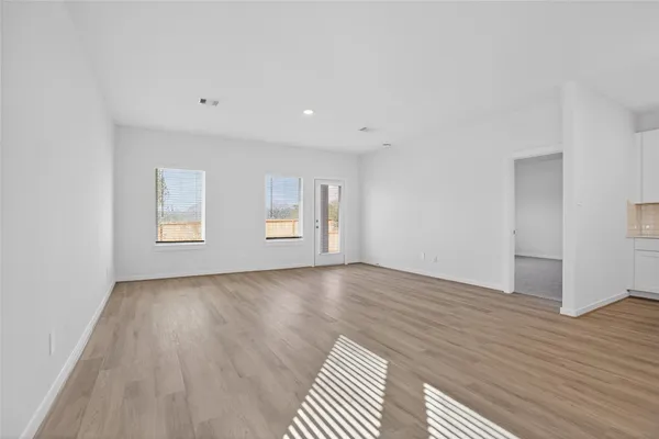 an empty room with windows