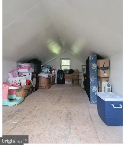 a living room filled with furniture and a couch