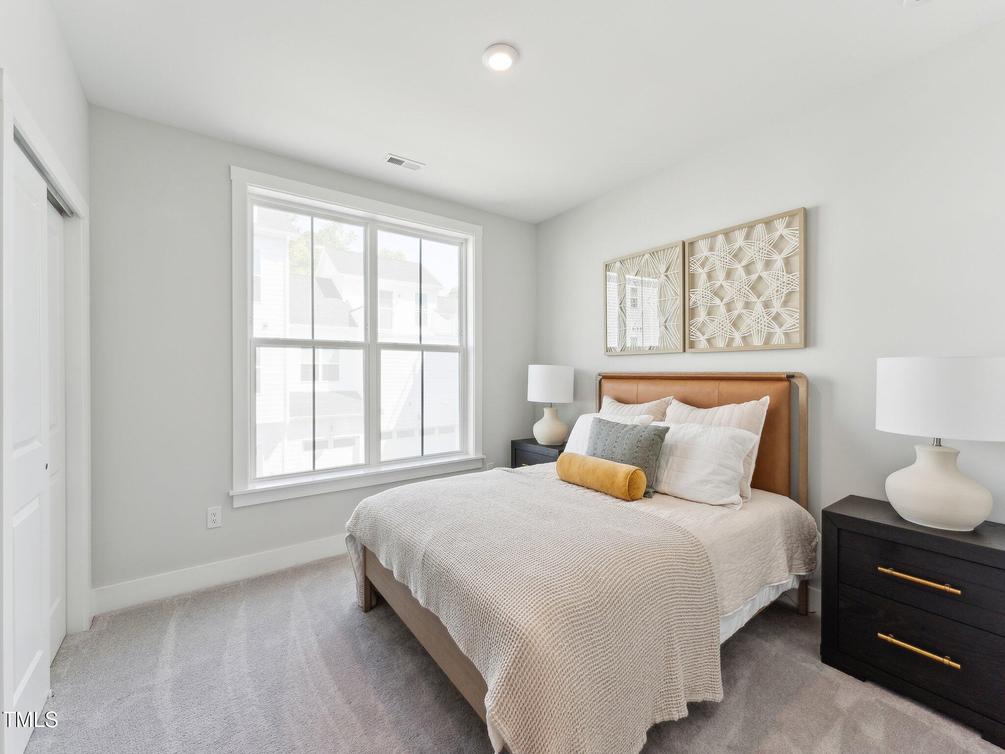 11549 Helmond Way, Unit 103 Raleigh, NC 27617 - Photo 12 of 17 Guest Bedroom