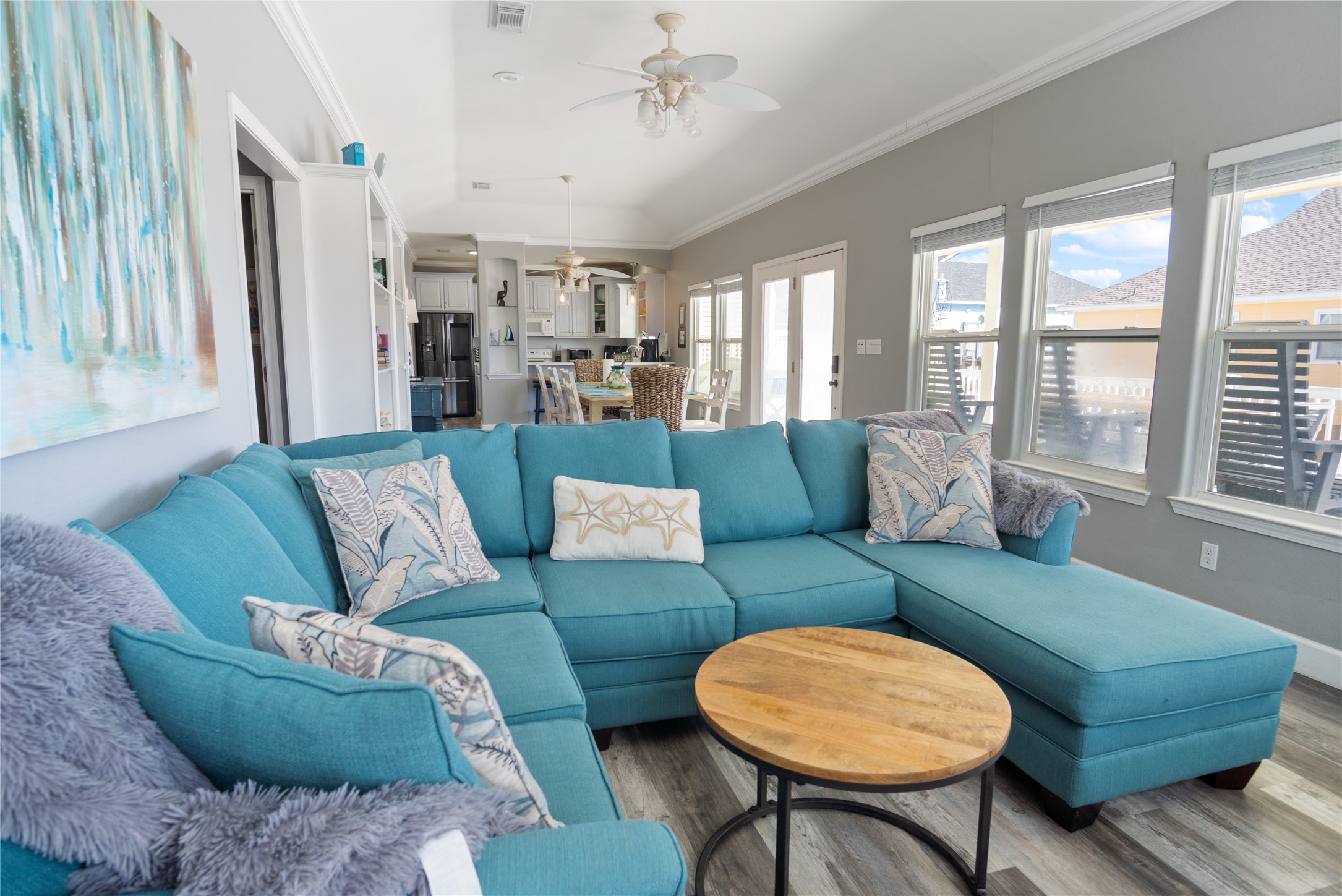 2296 Martinique Crystal Beach, TX 77650 - Photo 16 of 49 a living room with furniture and a large window