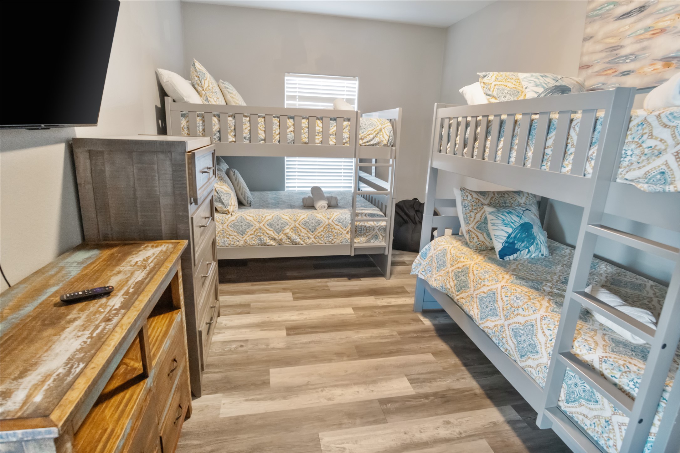 2296 Martinique Crystal Beach, TX 77650 - Photo 31 of 49 a bedroom with furniture and a fireplace