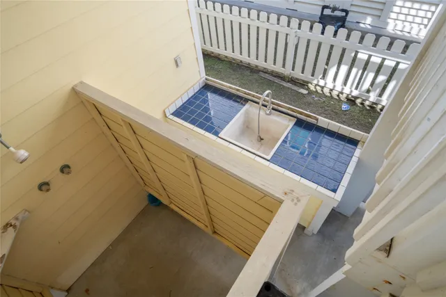 a view of swimming pool from a balcony